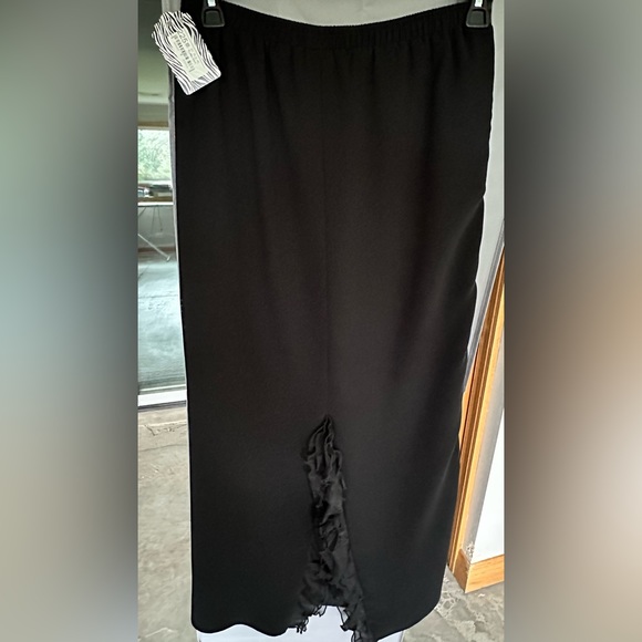 Beautiful skirt w/satin trim and ruffles in back slit! New/Never worn! Size XL. - Picture 5 of 5